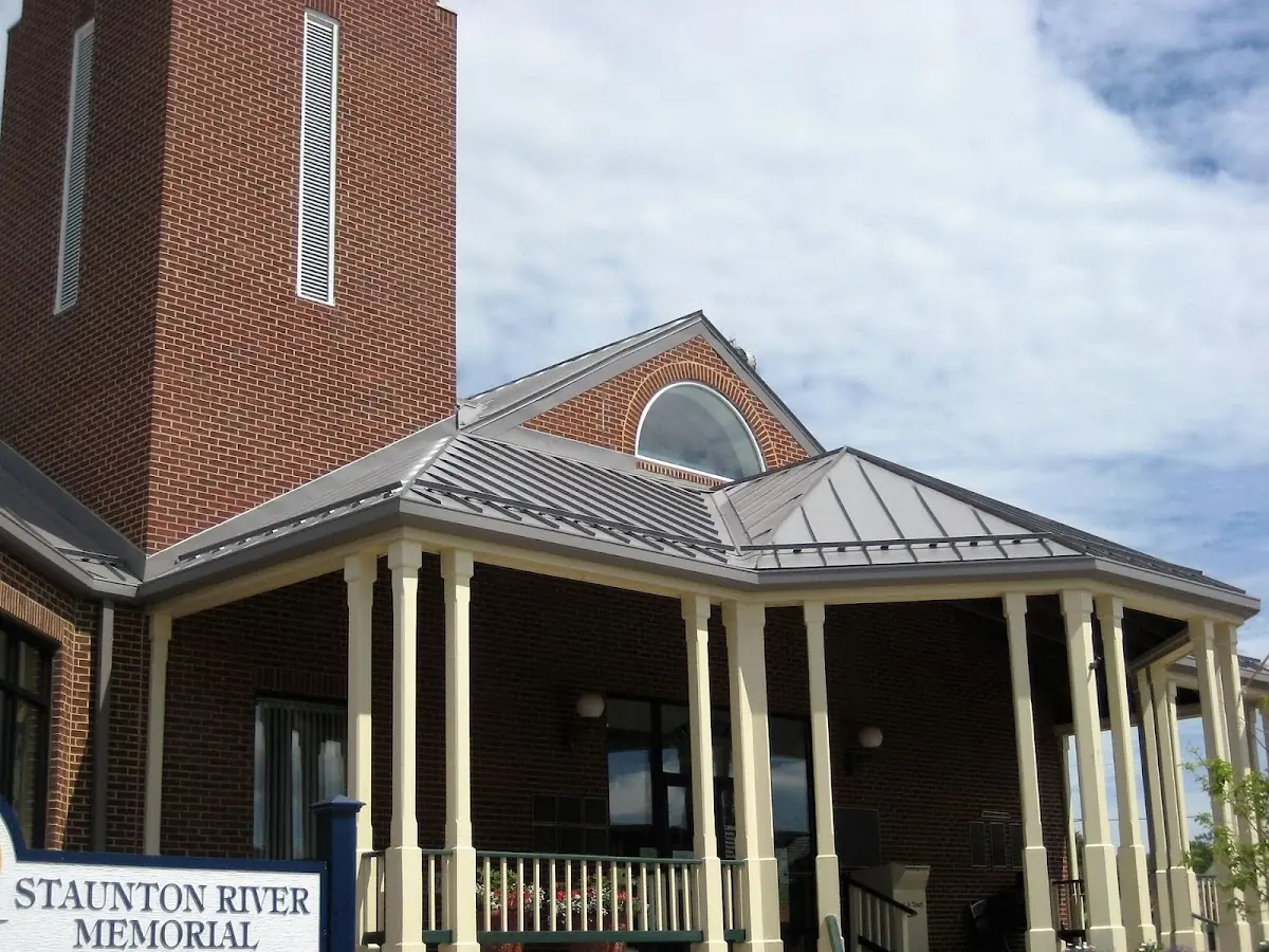Skilled roofing craftsmen working on a residential roof in Cherry Grove
